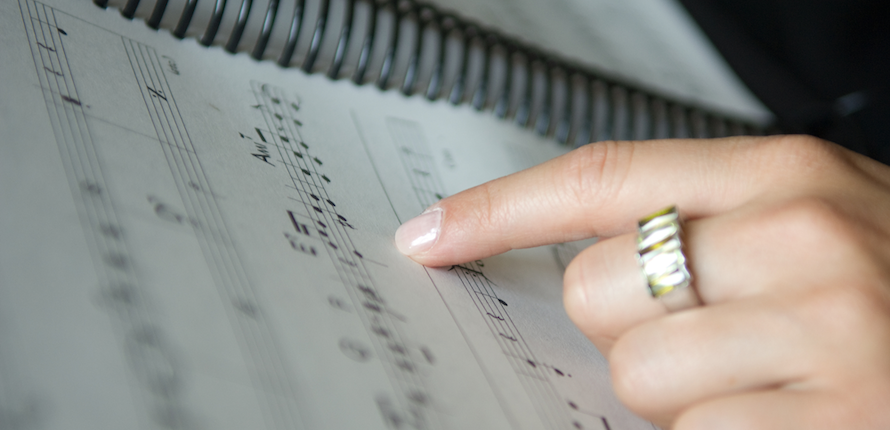Student playing piano Student playing piano